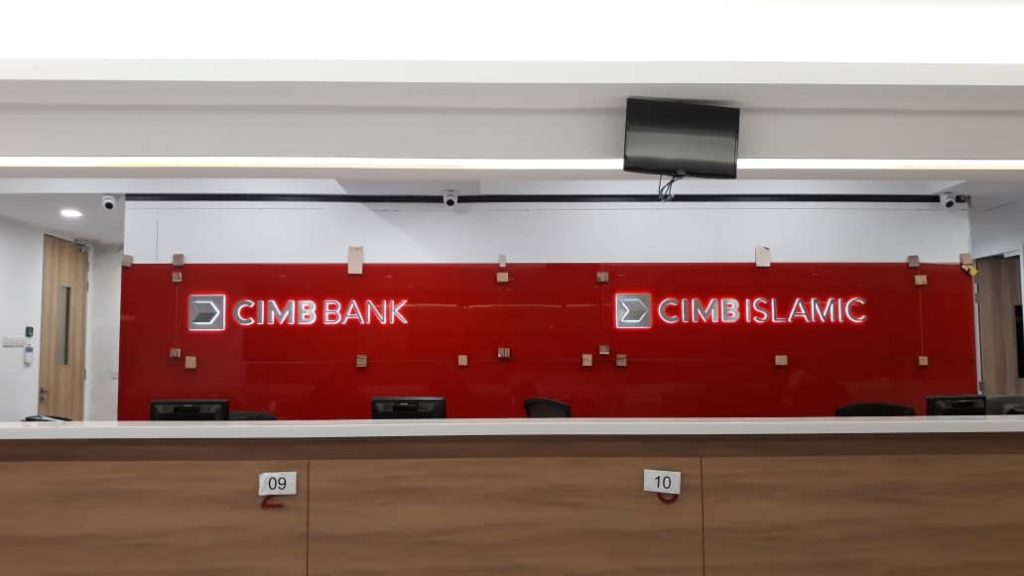 Reception signage waiting room at bank.